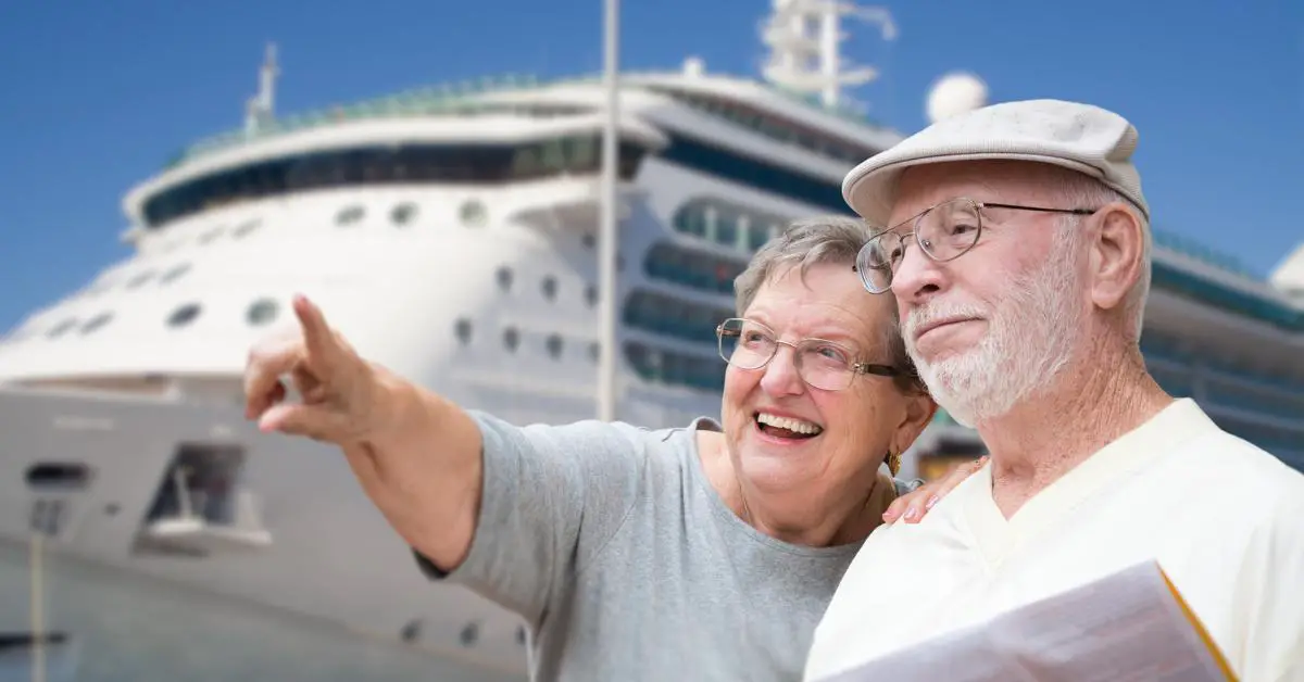 Senior couples next to cruise ship