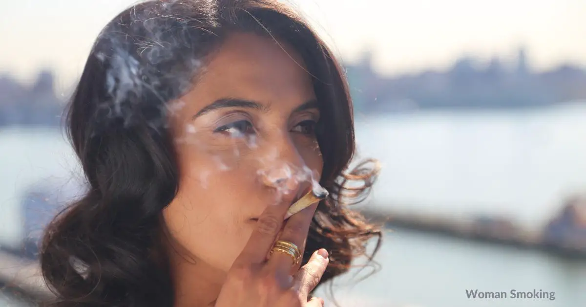 woman smoking roll up